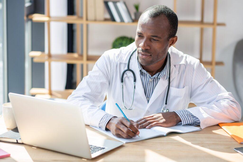 Doctor taking notes