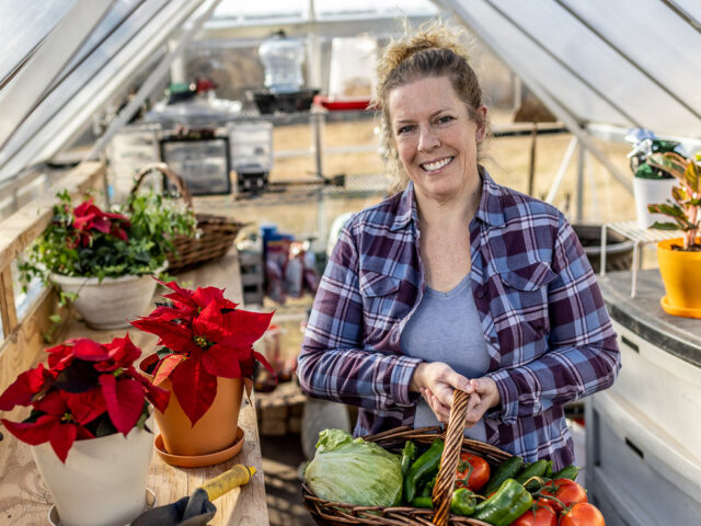 Susannah in the greenhouse